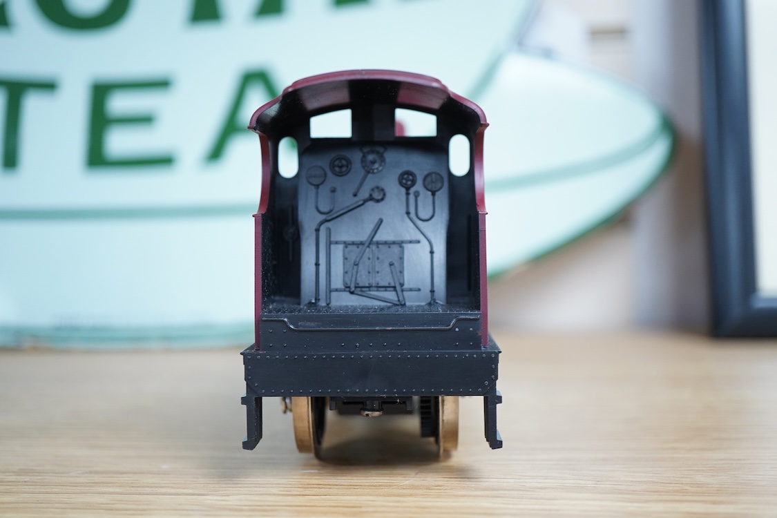 Eleven 0 gauge model railway items including; a bogie stake wagon, two mineral wagons, a North British coal wagon and two further open wagons, a partly constructed brake van, together with a Lima LMS 4F locomotive, two L